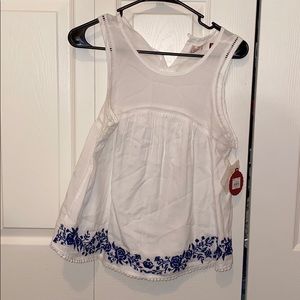 white tank with blue floral embroidery
